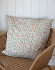 Light Blue and Rust Flowers Cushion