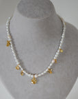 Intent Pearl and Gold Plated Charm Necklace